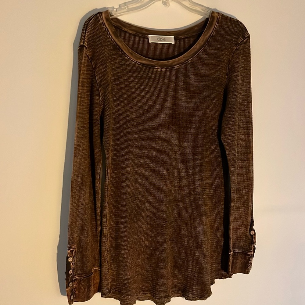 Super cute long ribbed top with button detail on wrists